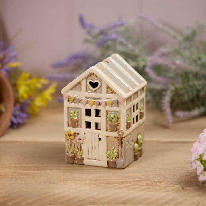 Grønt blomsterhus – telysholder i steingods