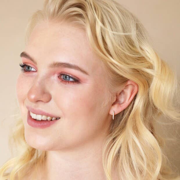 Crystal Huggie Hoop Earrings in Gold